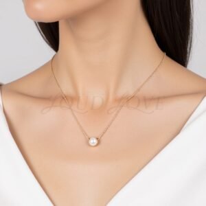 Rose gold necklace with a luminous Akoya pearl, celebrating June birthday.