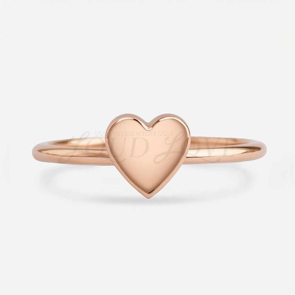 Rose gold ring with a polished, solid heart-shaped design.