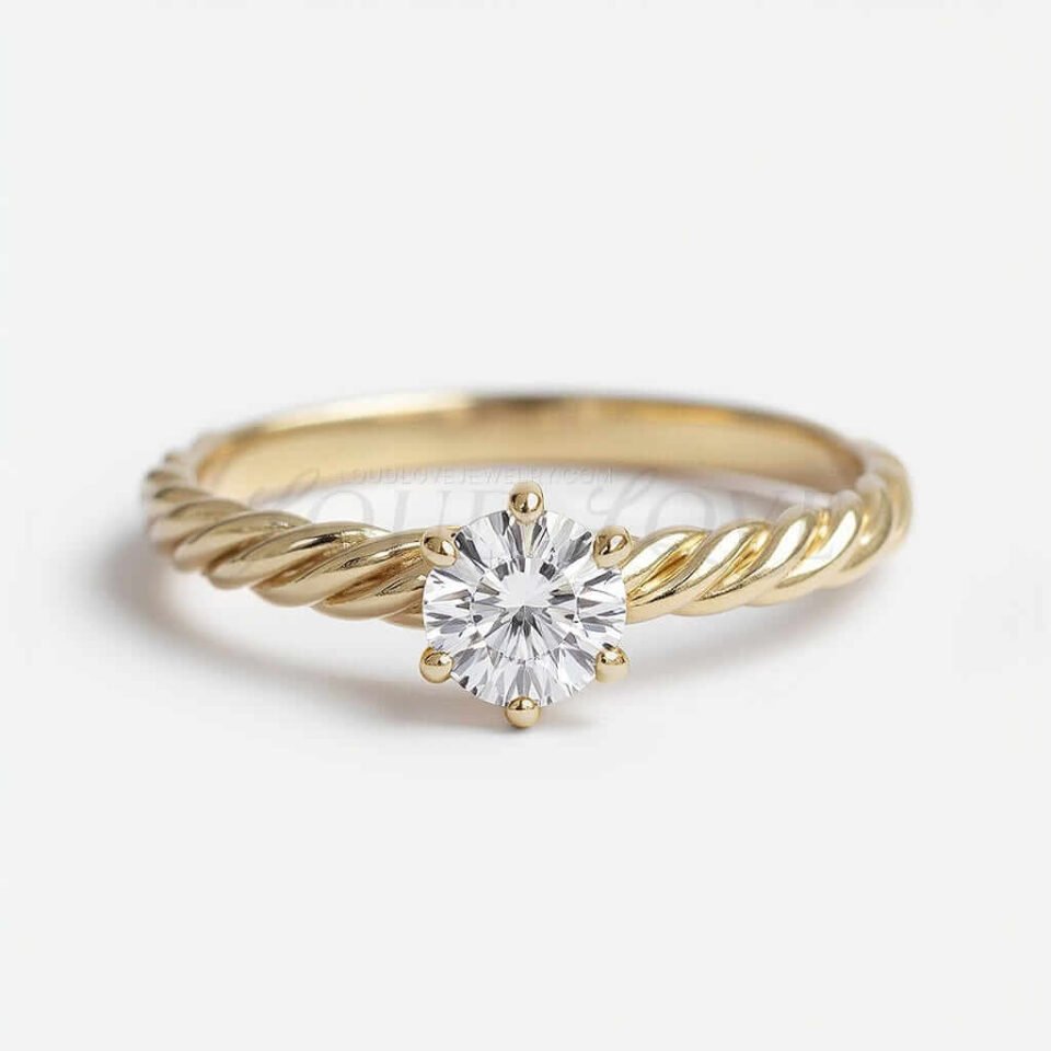 Round solitaire engagement ring in a 6-prong setting with a wide braided yellow gold band.