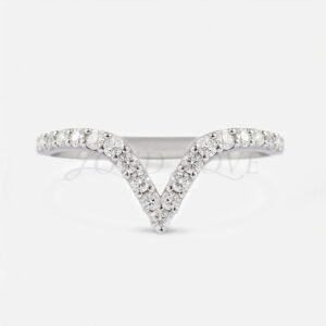 Chevron band with small pave-set diamonds designed for stacking or worn as a wedding band.