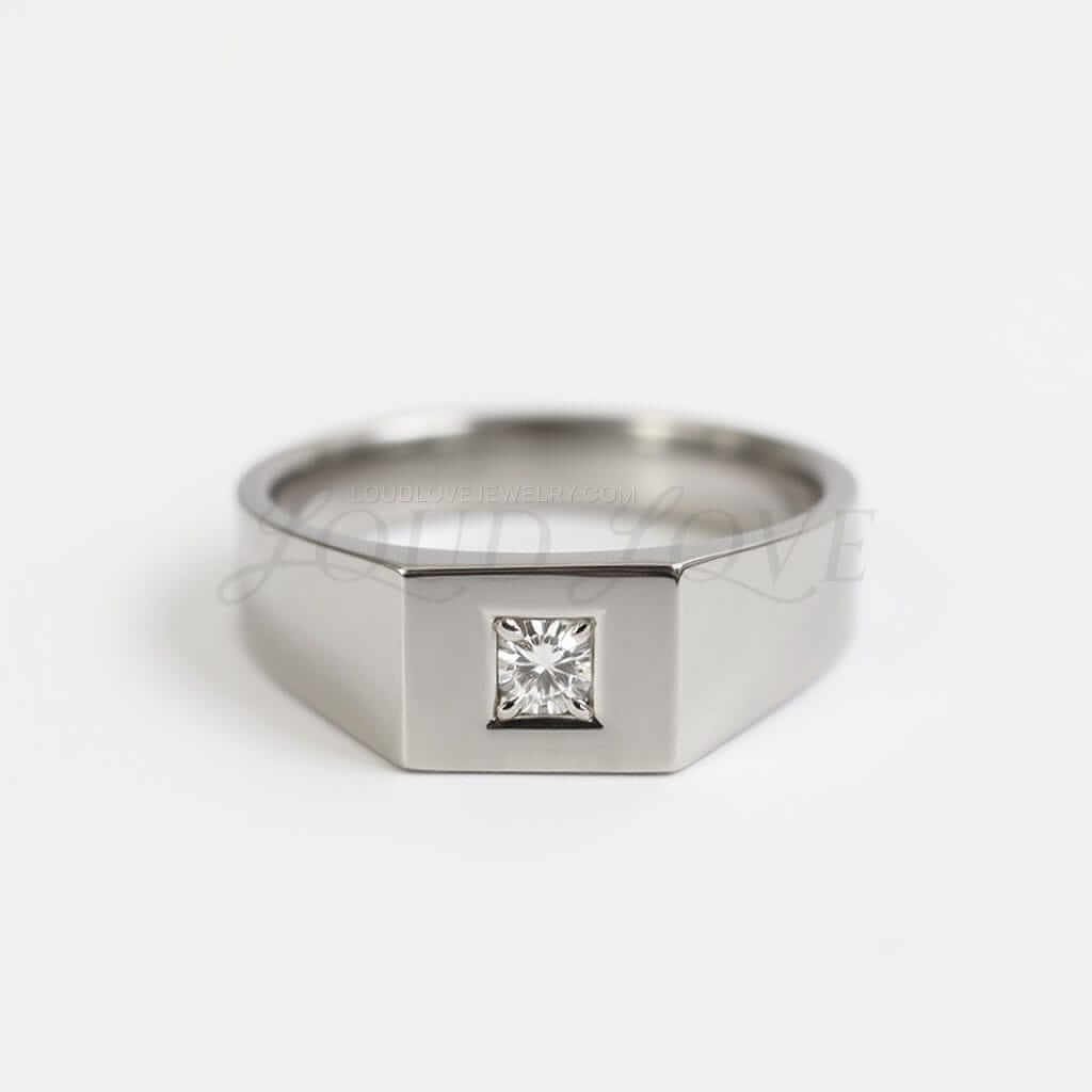 Round lab diamond in a square signet-style ring, front view.