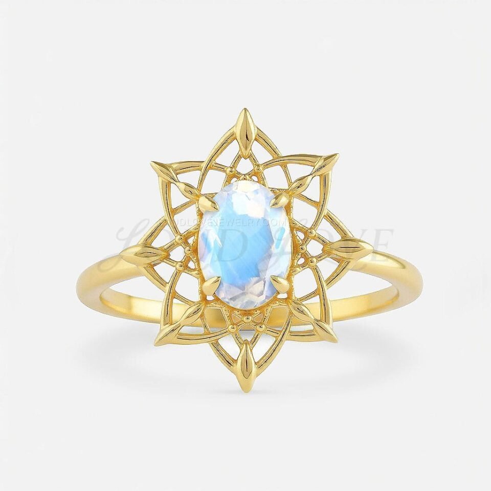 Oval moonstone set in yellow gold with a dreamcatcher-inspired design and 4 prongs.