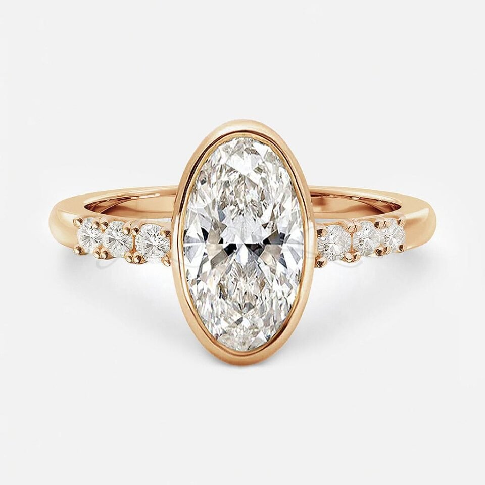 Elongated oval moissanite ring with bezel setting and six side stones, front view.