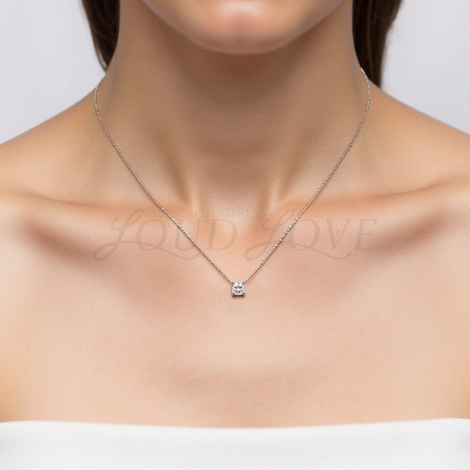 Simple necklace with a lab-grown princess diamond, worn to celebrate April birthday.