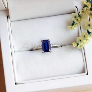 modern-platinum-sapphire-ring-three-stone-design