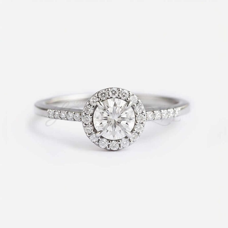 Round moissanite halo ring with half eternity band in platinum.