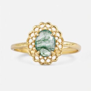 Oval moss agate ring with lace halo setting, front-facing.