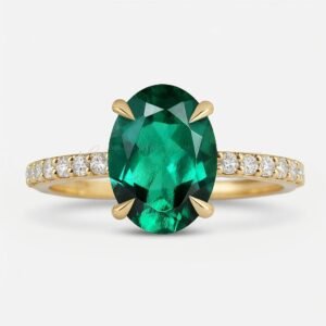 Lab-grown oval emerald in 4-prong setting with moissanite half eternity gold band.