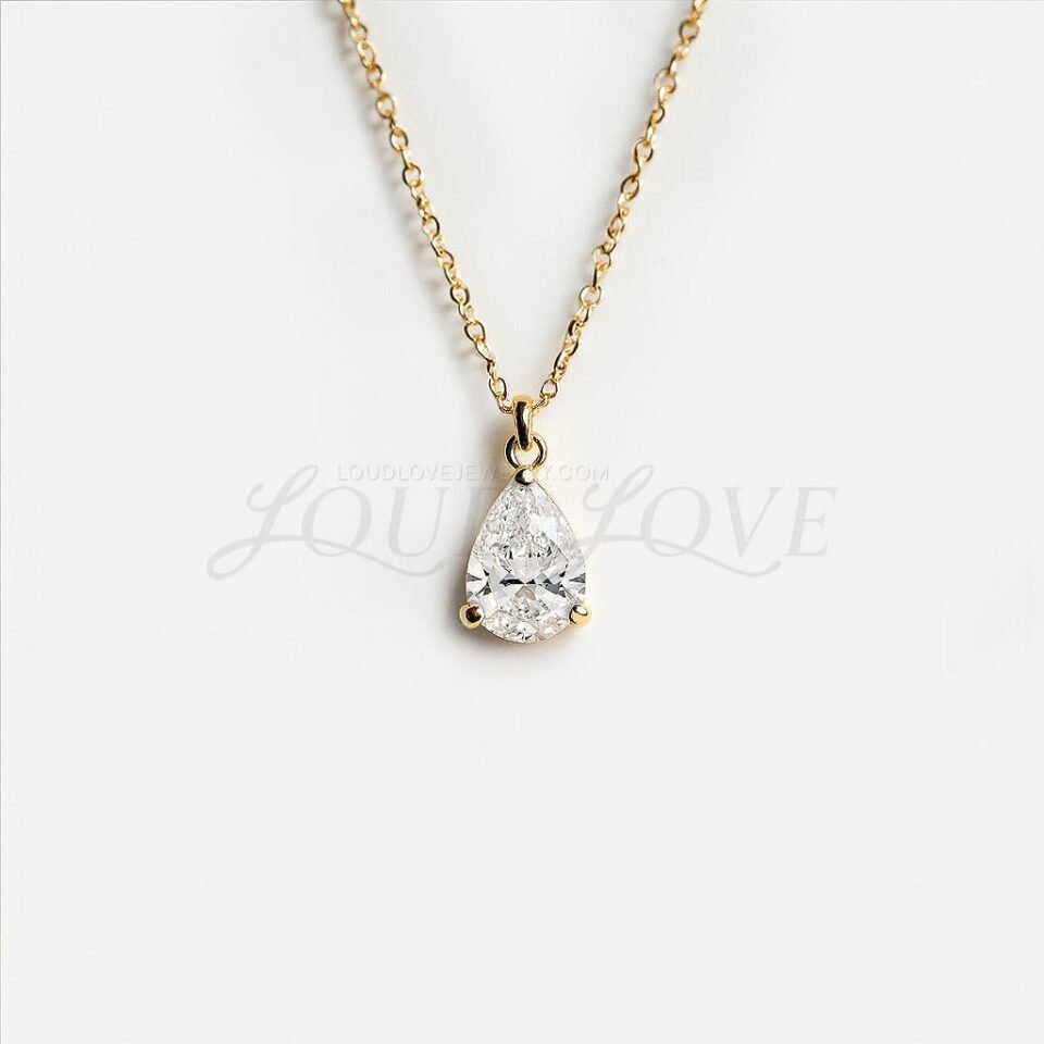 Solitaire drop necklace with a lab-grown pear-shaped diamond in a minimal setting.
