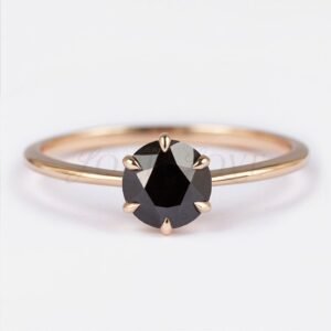 Round black diamond solitaire in a 6-prong rose gold setting.
