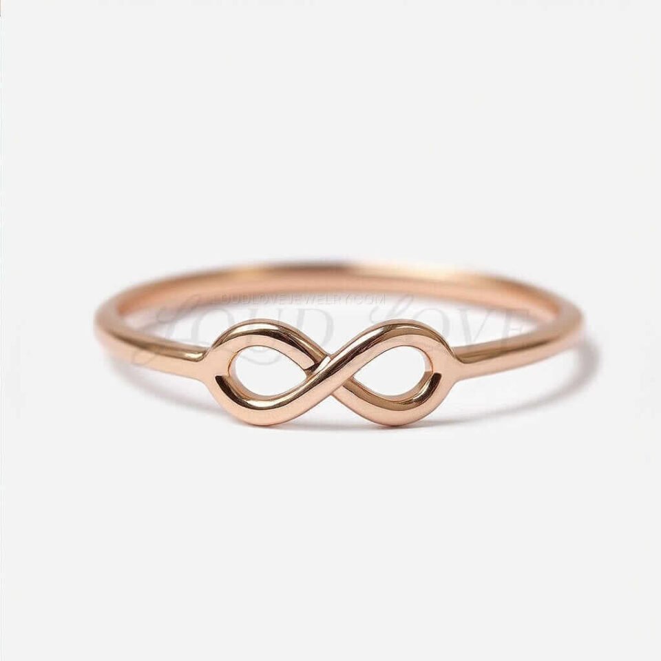 14k Rose gold infinity ring with a simple infinity sign design.