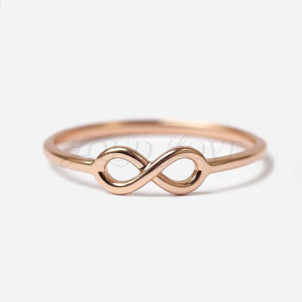14k Rose gold infinity ring with a simple infinity sign design.