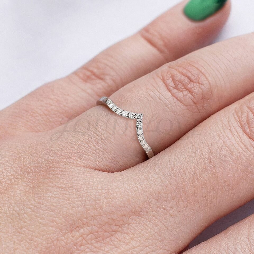 Stackable eternity ring worn solo or stacked with an engagement ring.