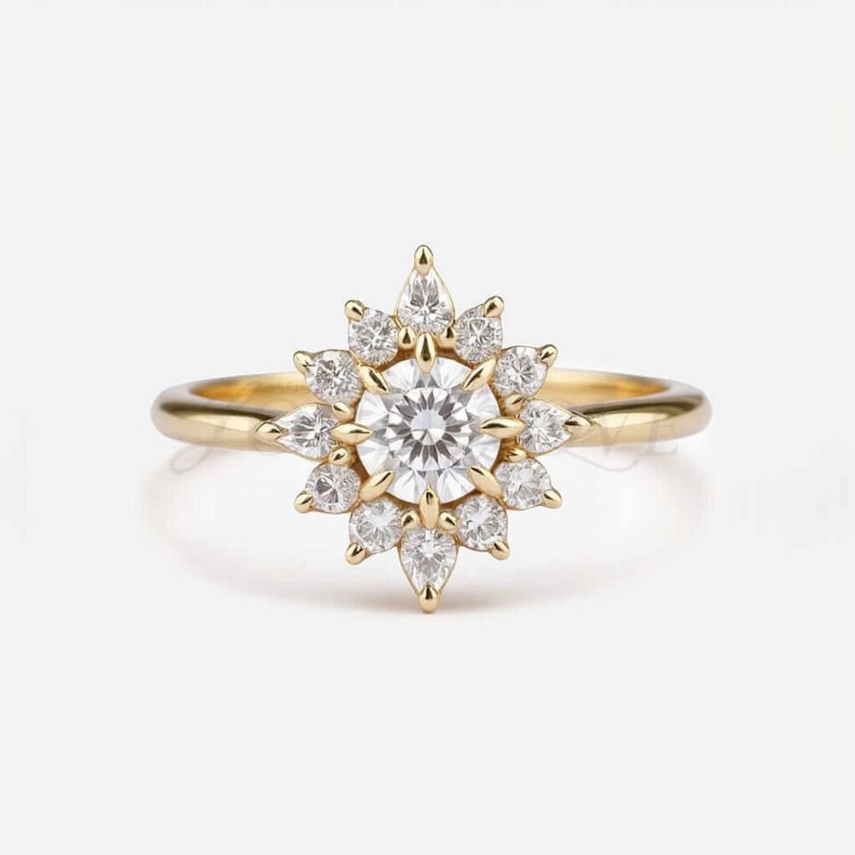 Round moissanite with pear and round halo stones in a starburst-inspired gold setting.