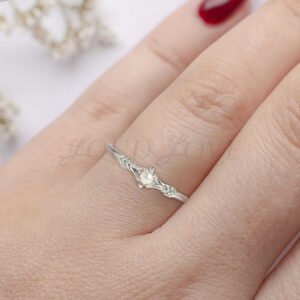 tiny-silver-pearl-ring-arrow-texture