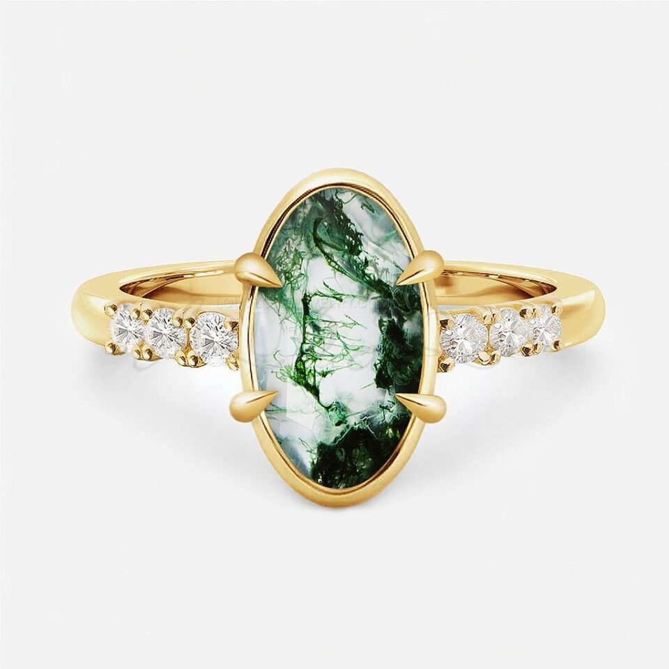 Uniquely shaped moss agate ring with gold rim and six accent stones, front view.
