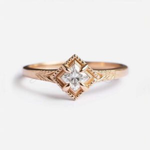 Princess cut moissanite solitaire with wide gold rim and vintage detailing.